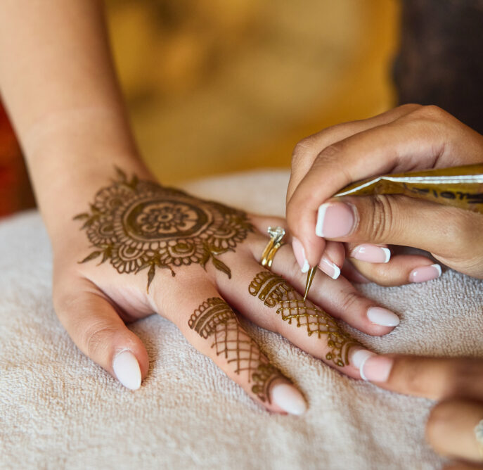 henna application during mehndi party