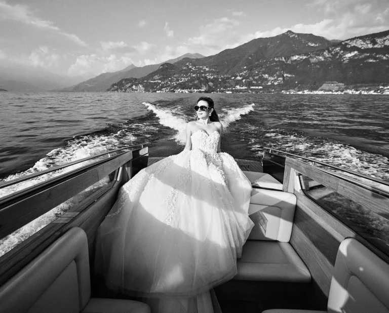 the extraordinaire lake como bride poses on the shores