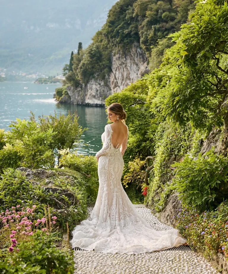 the extraordinaire lake como bride poses on the shores