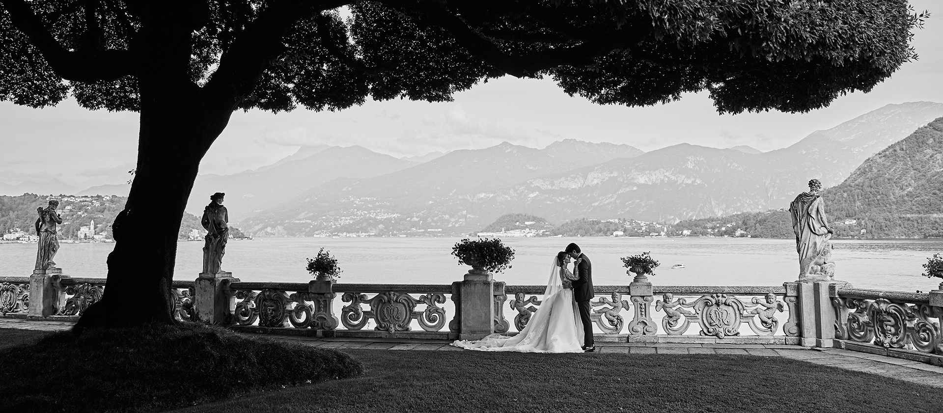 the extraordinaire lake como wedding planner couple silhouetted mountain backdrop