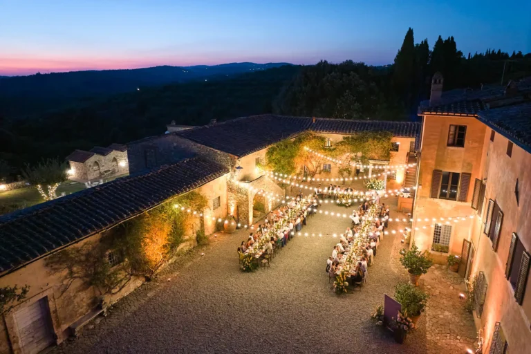 the extraordinaire villa catignano drone view string lighting courtyard