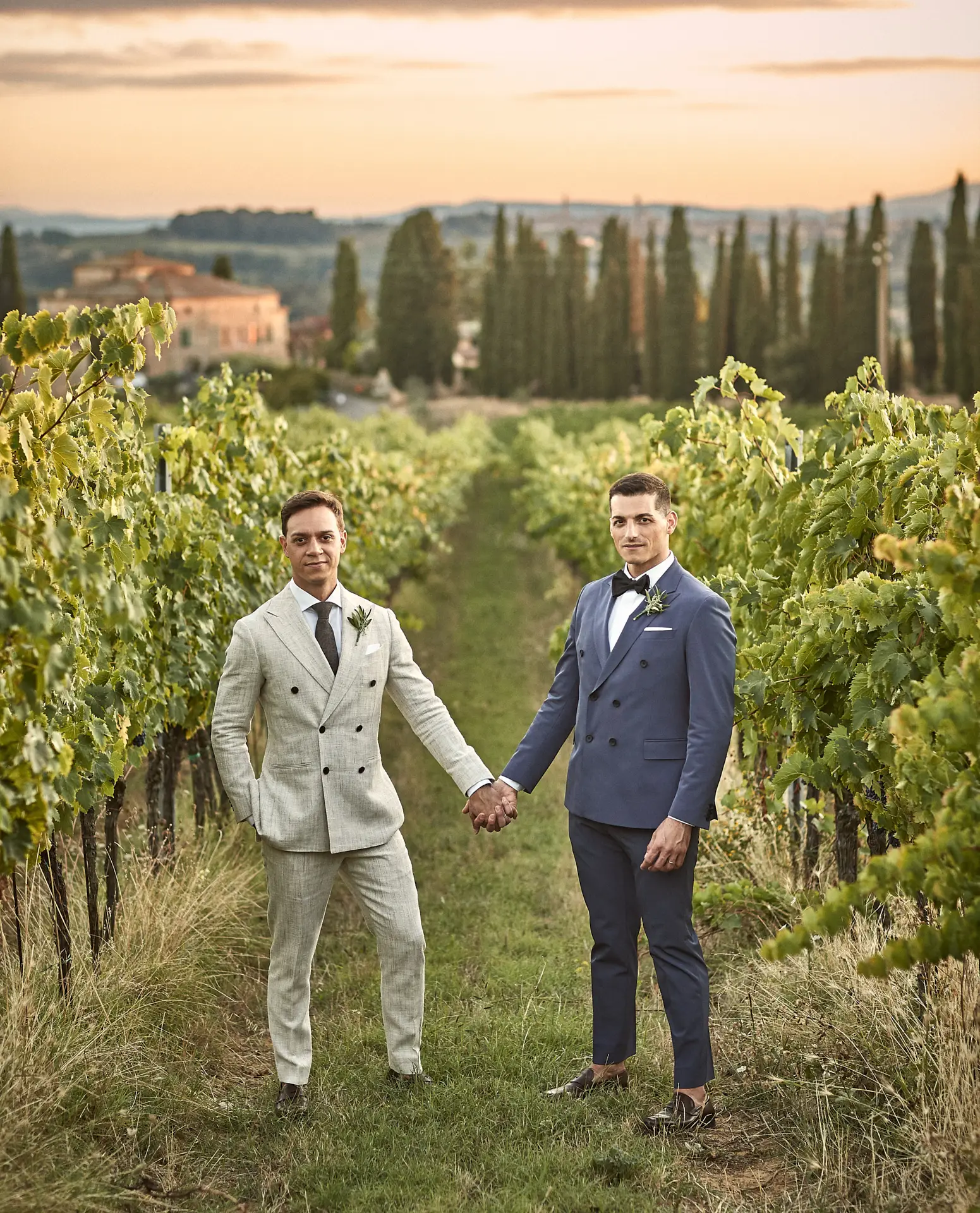 the extraordinaire lgtbq plus wedding planner in italy couple in vineyard at sunset
